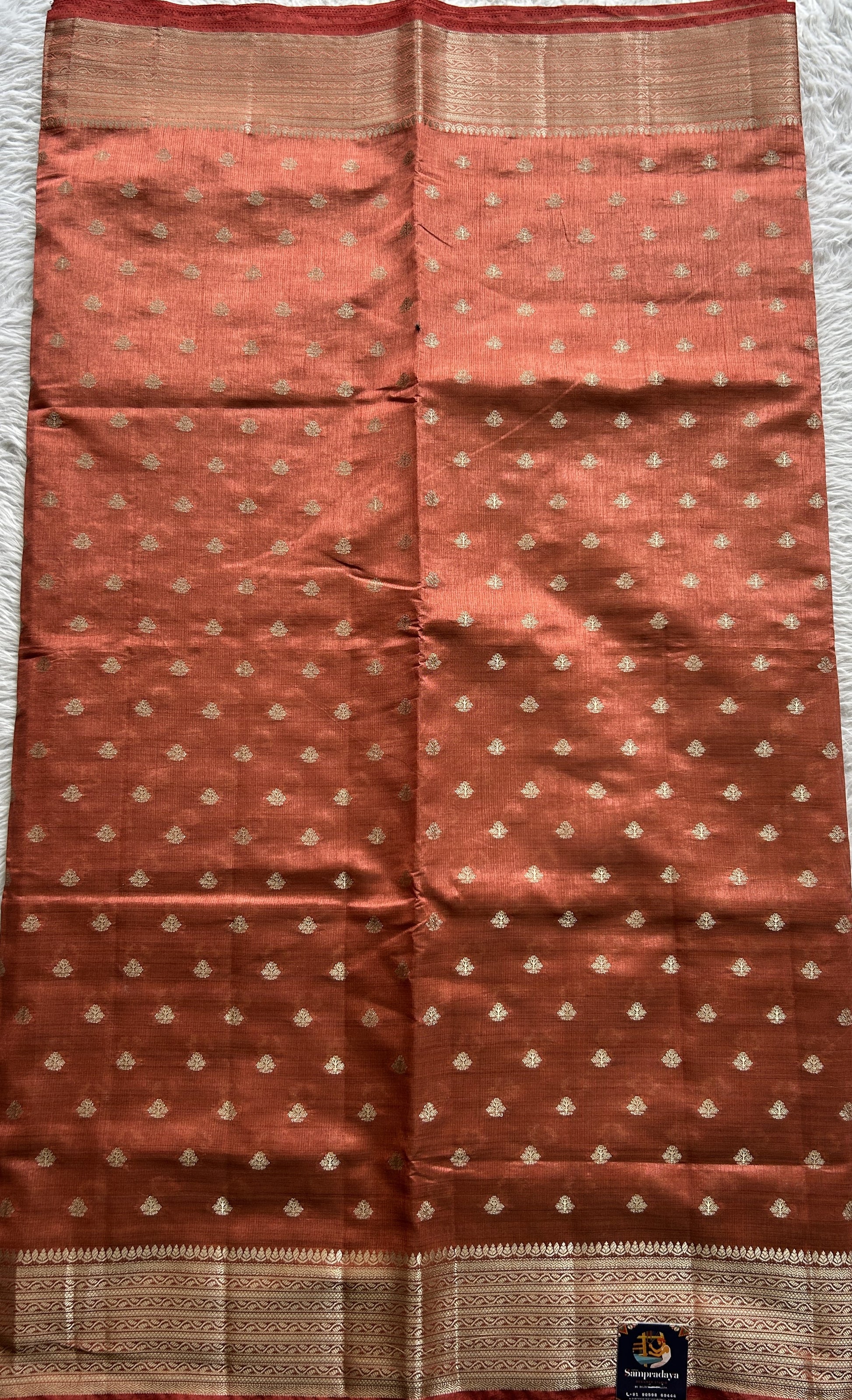 Semi Tussar Saree Peach Colored Complemented with a Zari Border. - Sampradaya Designer Studio