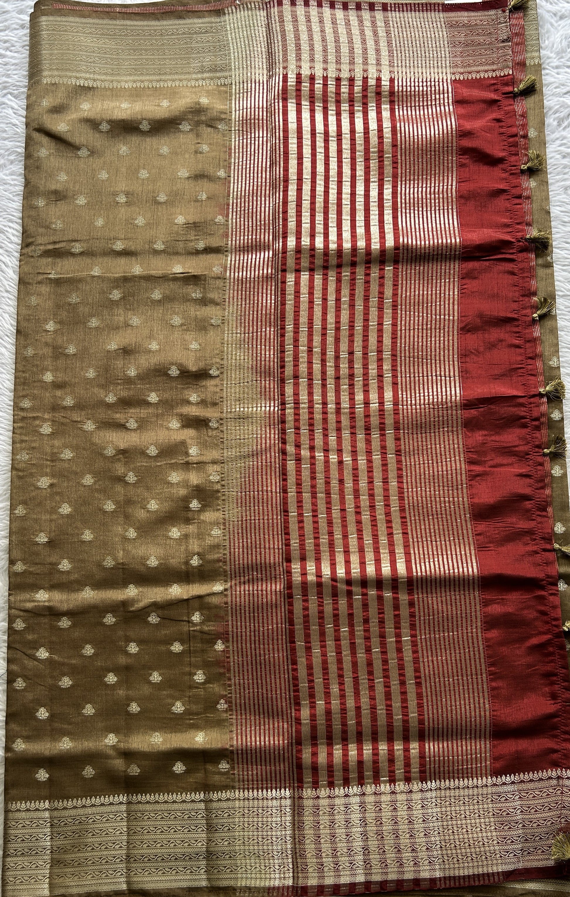Semi Tussar Saree Dark Olive Green Colored Complemented with a Zari Border. - Sampradaya Designer Studio