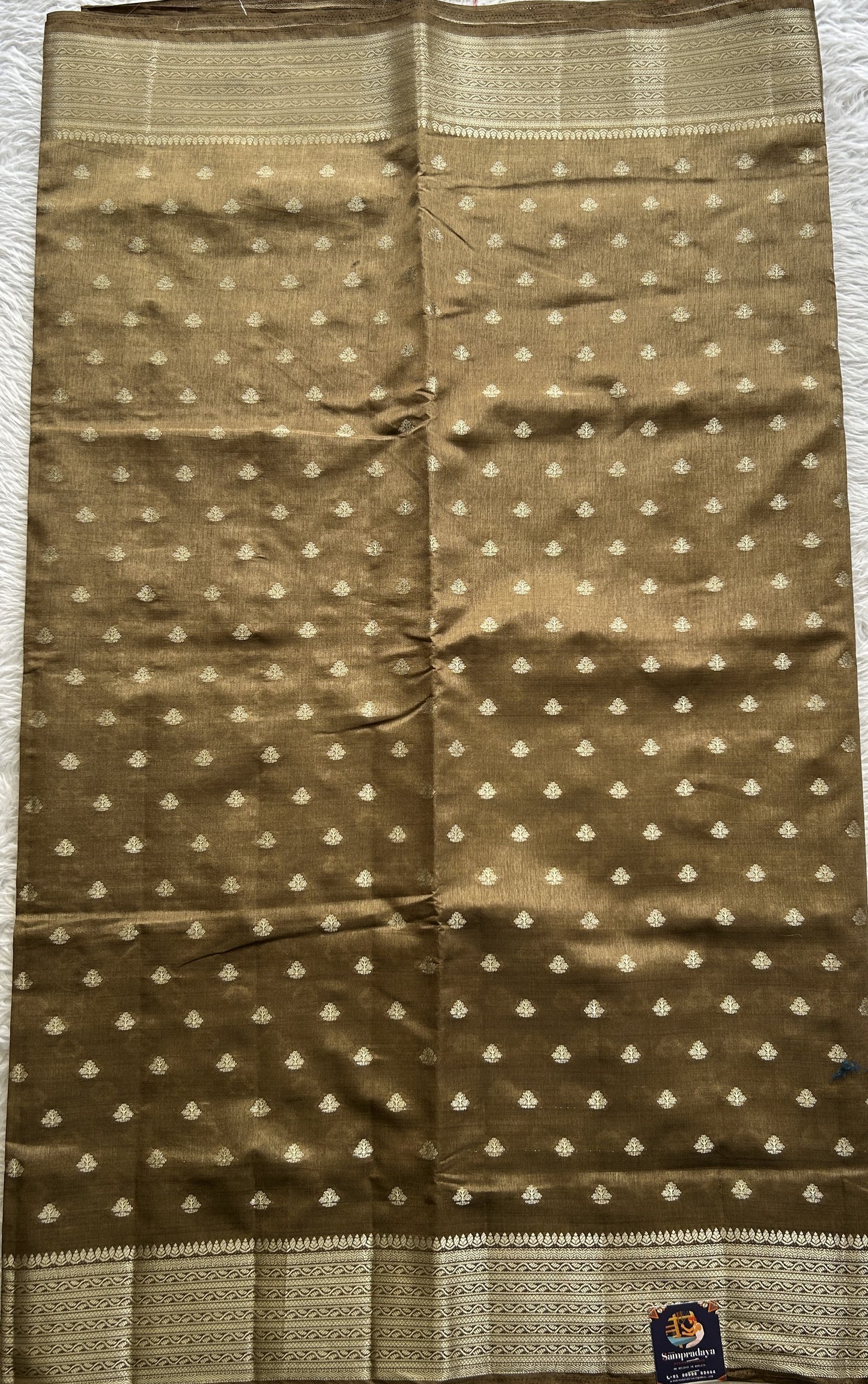 Semi Tussar Saree Dark Olive Green Colored Complemented with a Zari Border. - Sampradaya Designer Studio