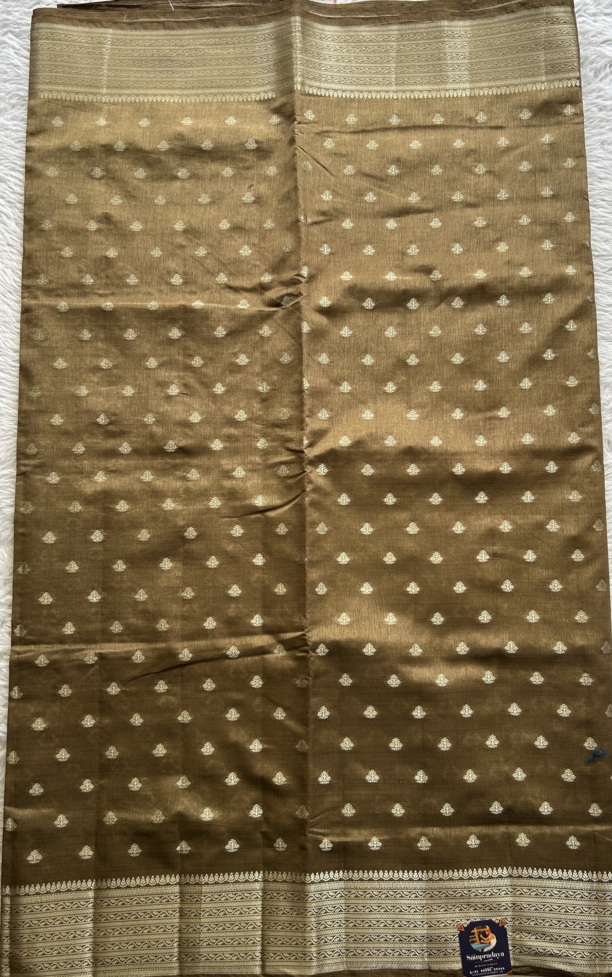 Semi Tussar Saree Dark Olive Green Colored Complemented with a Zari Border. - Sampradaya Designer Studio