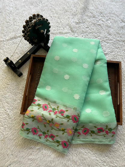 Silk Kota Saree Lagoon Colored Elegantly Paired with a Tissue Border