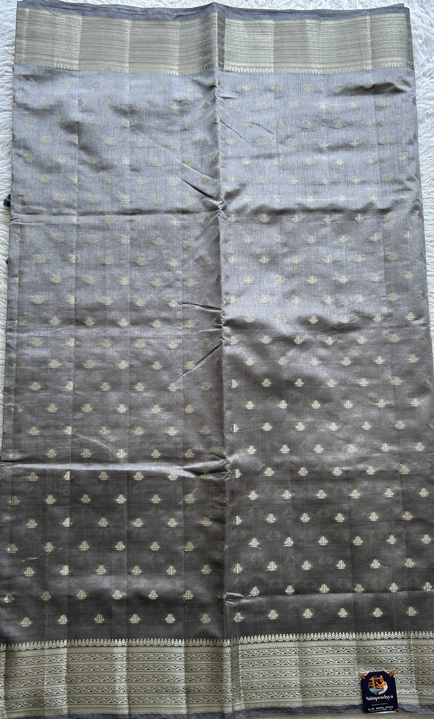 Semi Tussar Saree Gray Colored Complemented with a Zari Border. - Sampradaya Designer Studio