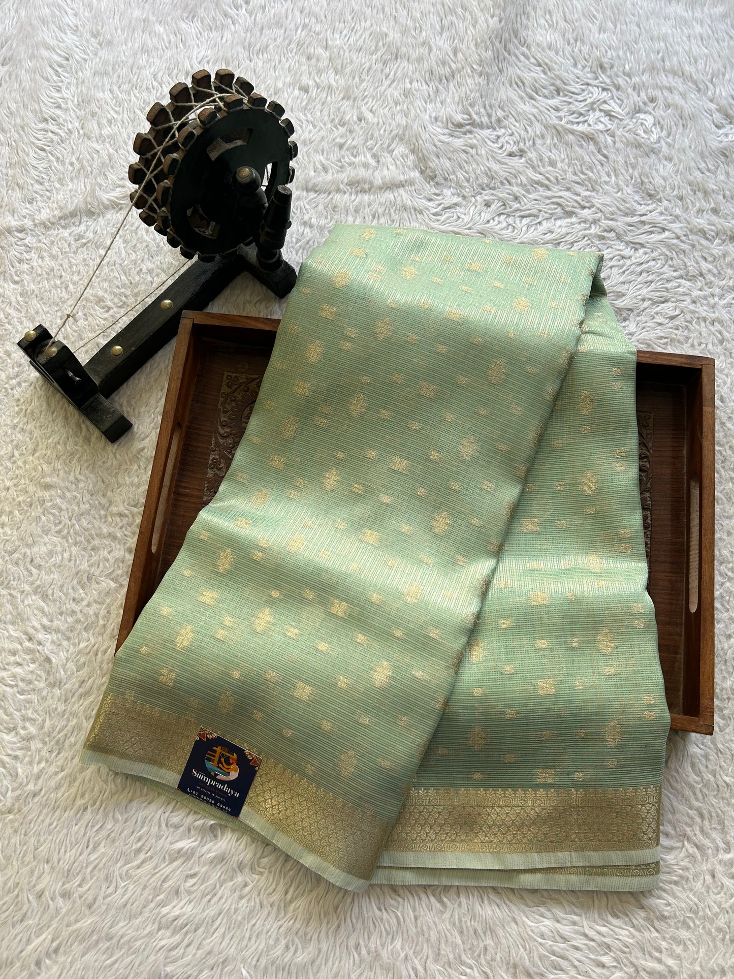 Tissue Kota Saree Mint Green Colored Elegantly Paired with a Tissue Border