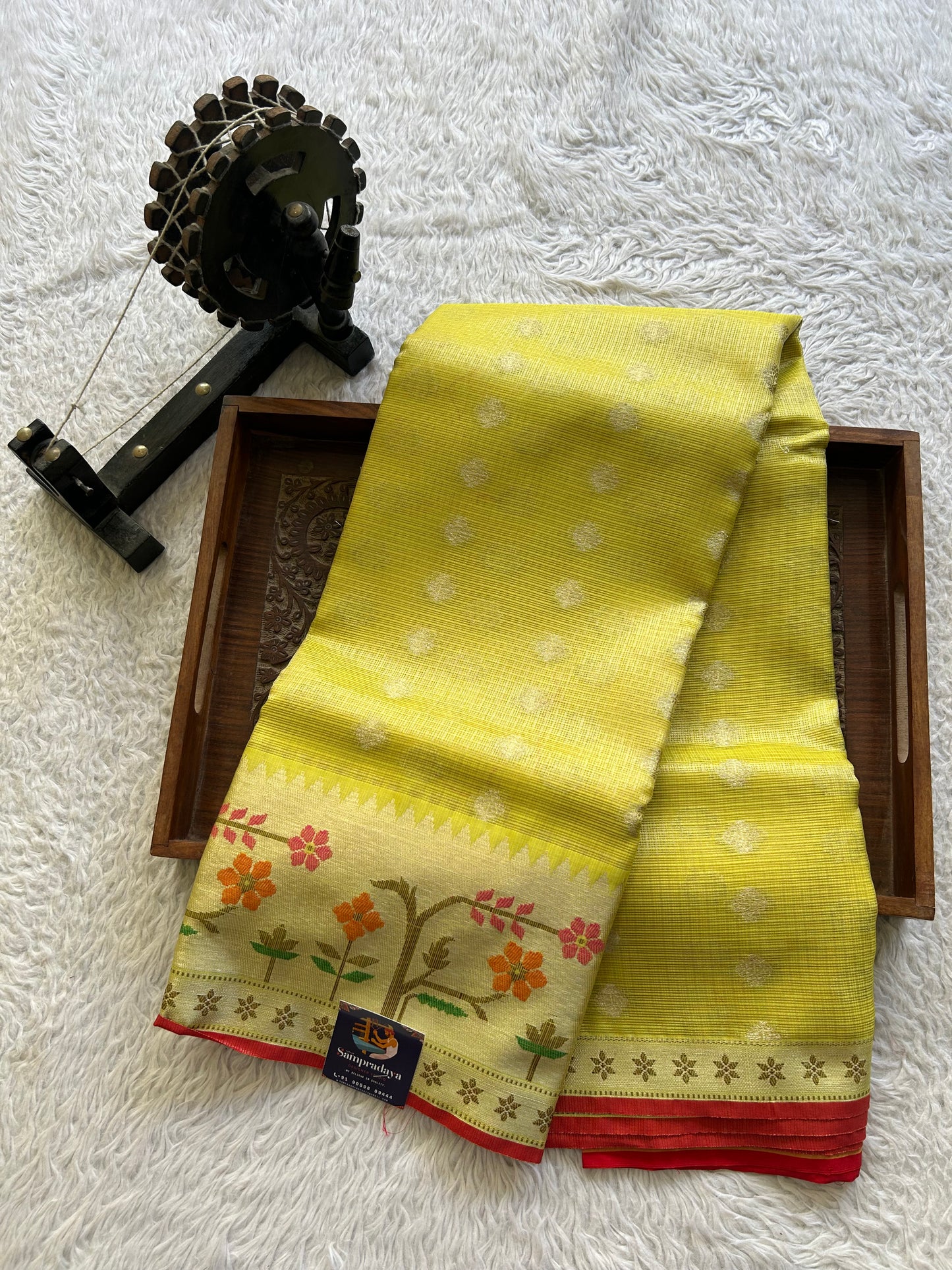 Tissue Kota Saree Yellow Colored Elegantly Paired with a Tissue Border
