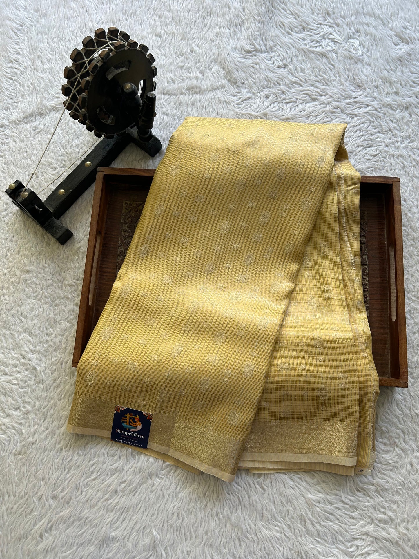 Tissue Kota Saree Light Honey Yellow Colored Elegantly Paired with a Tissue Border
