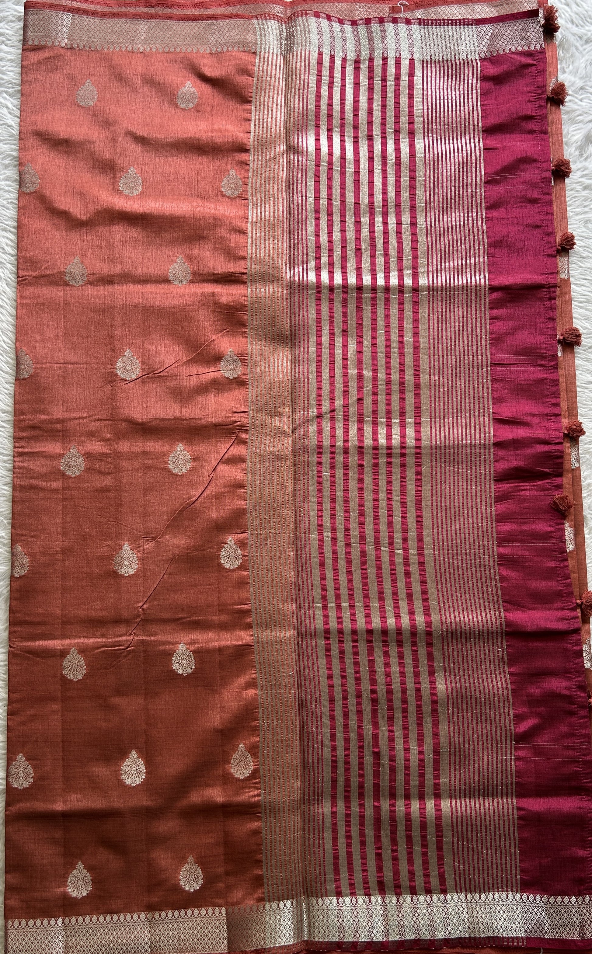 Semi Tussar Saree Rust Colored complemented with a Zari Border. - Sampradaya Designer Studio