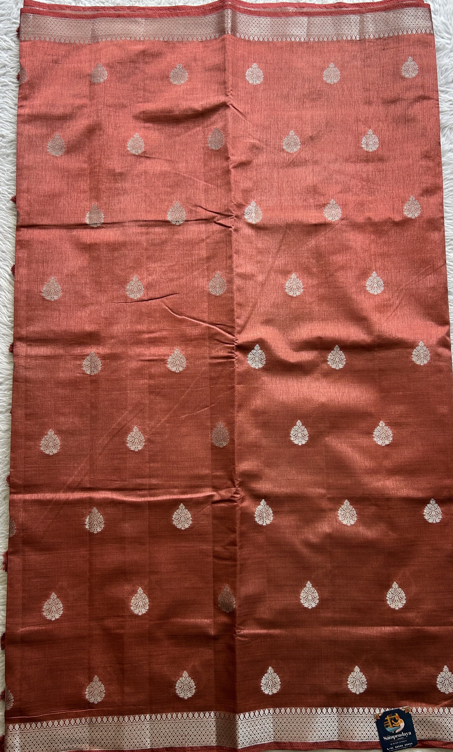 Semi Tussar Saree Rust Colored complemented with a Zari Border. - Sampradaya Designer Studio