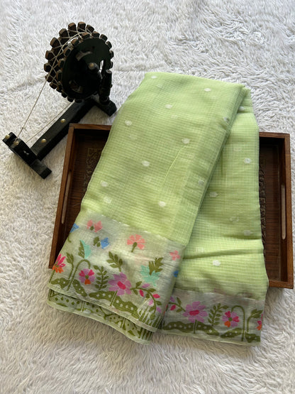 Silk Kota Saree Light Pista Green Colored Elegantly Paired with a Tissue Border