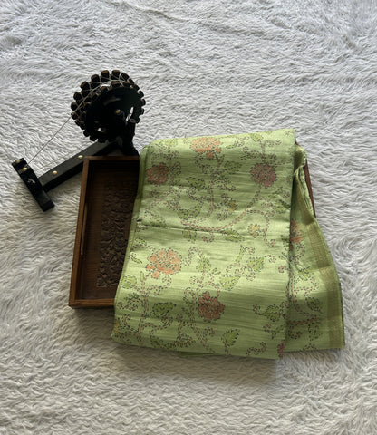 Semi Tussar Saree Colored Parrot Green Complemented with a Zari Border. - Sampradaya Designer Studio