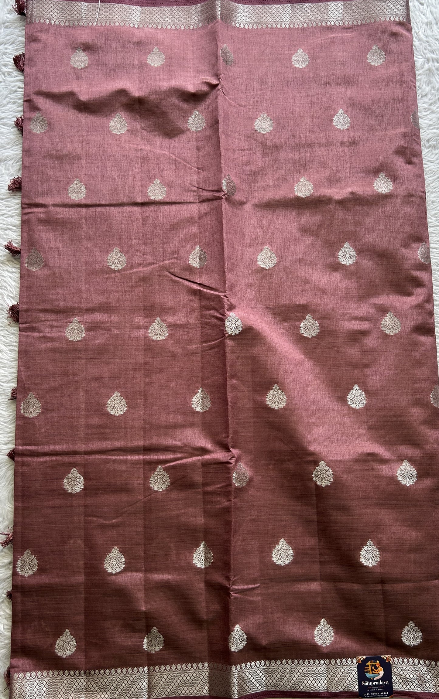 Semi Tussar Saree Magenta Colored complemented with a Zari Border. - Sampradaya Designer Studio