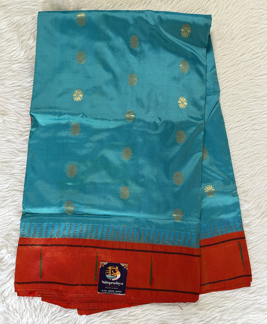 Paithani Silk Saree Blue Colored Saree Complemented With a Orange Colored Muniya Border - Sampradaya Designer Studio