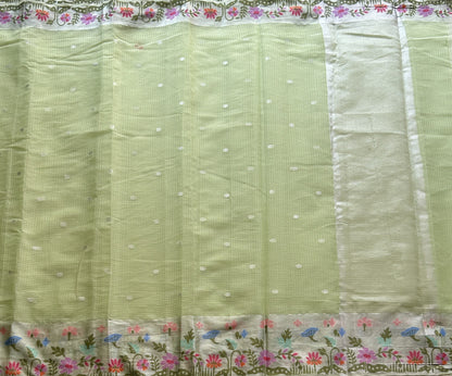 Silk Kota Saree Light Pista Green Colored Elegantly Paired with a Tissue Border