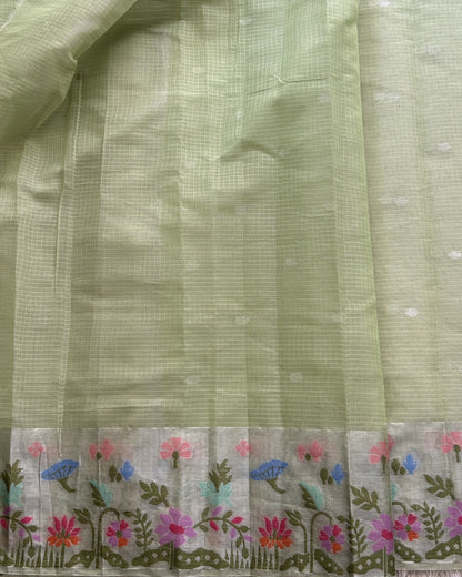 Silk Kota Saree Light Pista Green Colored Elegantly Paired with a Tissue Border