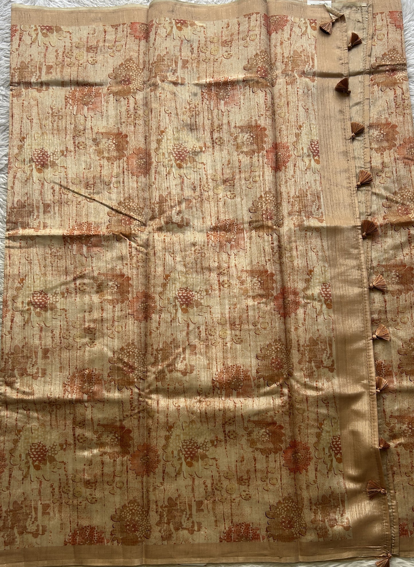 Semi Tussar Saree Light Orange Colored Elegantly Paired with a Borderless. - Sampradaya Designer Studio
