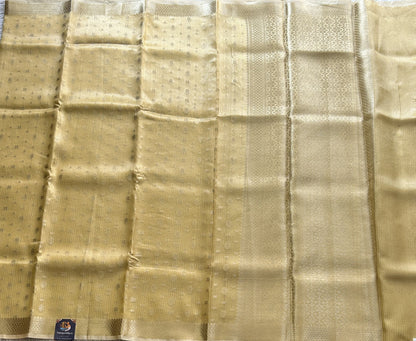 Tissue Kota Saree Light Honey Yellow Colored Elegantly Paired with a Tissue Border