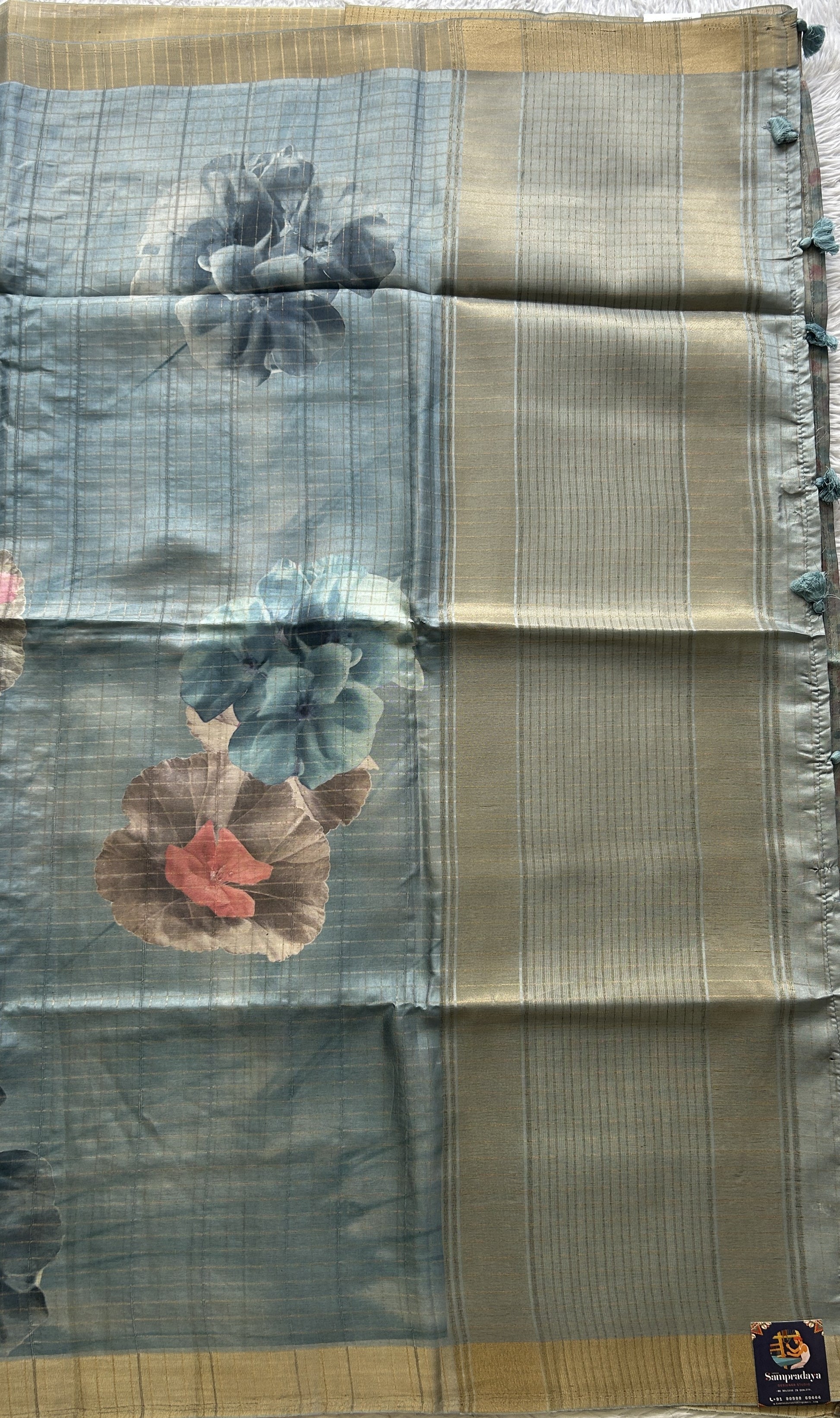 Semi Tussar Saree Colored Aqua Blue Complemented with a Zari Border. - Sampradaya Designer Studio