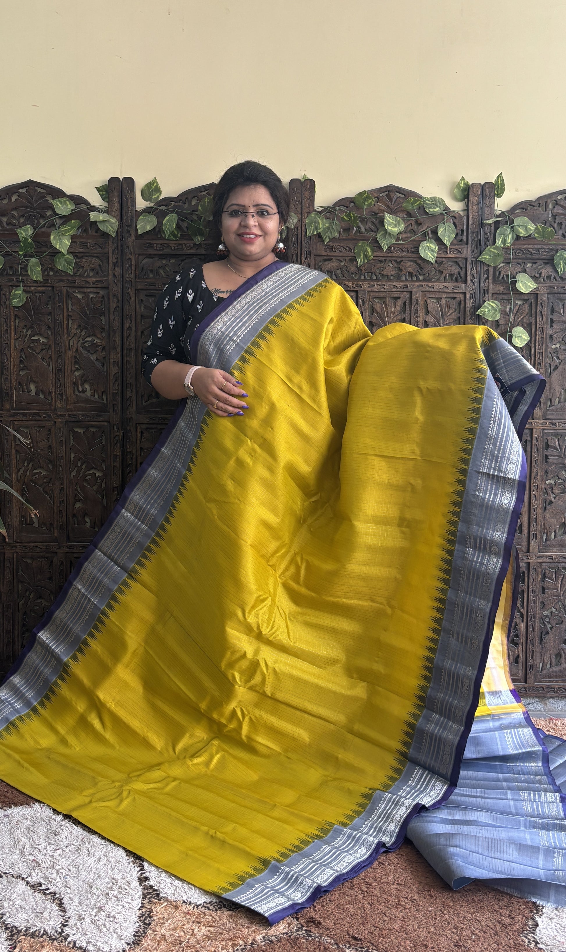 Gadwal Silk Saree Yellow Colored Complemented With a Gray Zari Border - Sampradaya Designer Studio
