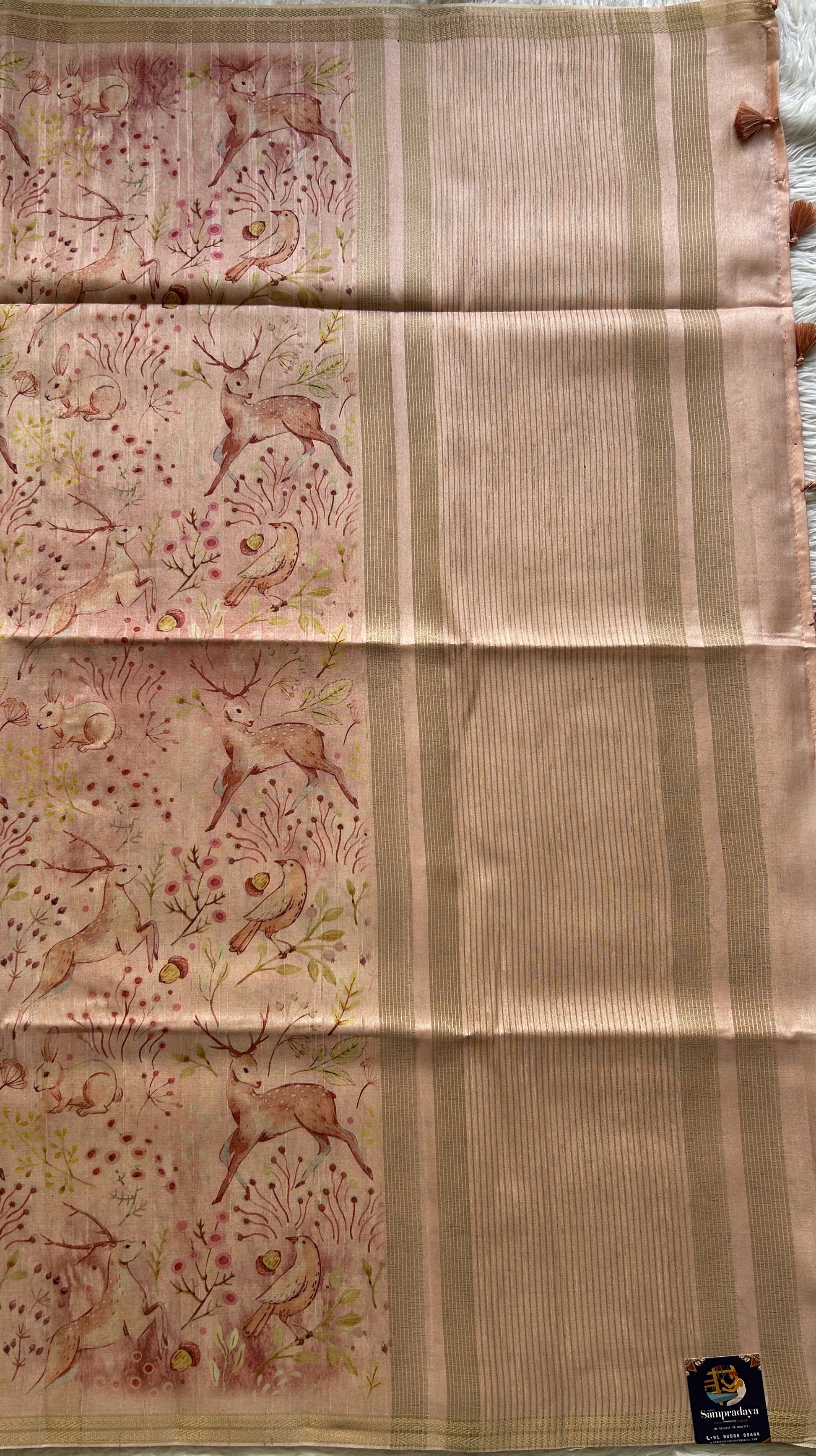 Semi Tussar Saree Colored Light Peach Complemented with a Zari Border. - Sampradaya Designer Studio