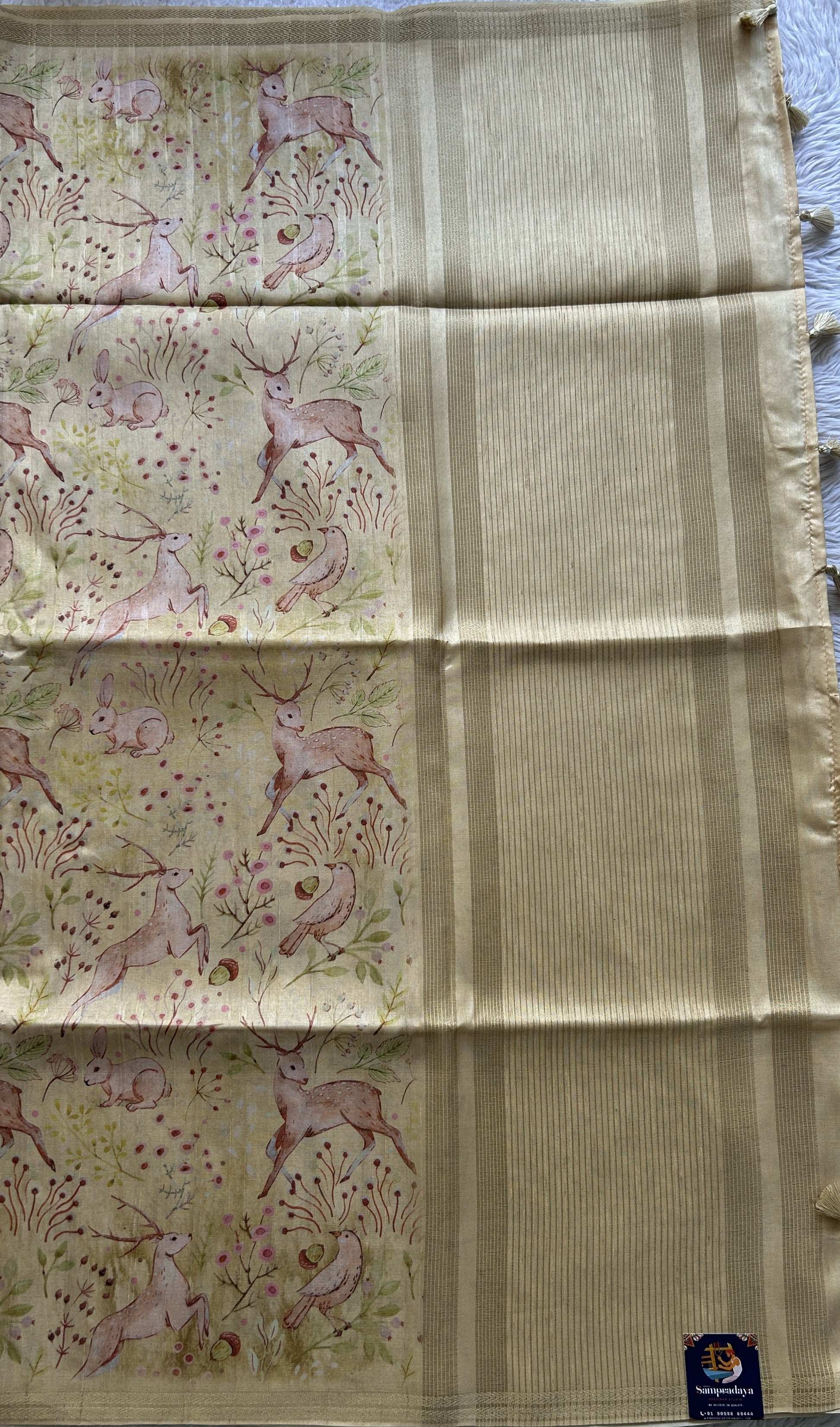Semi Tussar Saree Colored Light Yellow Complemented with a Zari Border. - Sampradaya Designer Studio