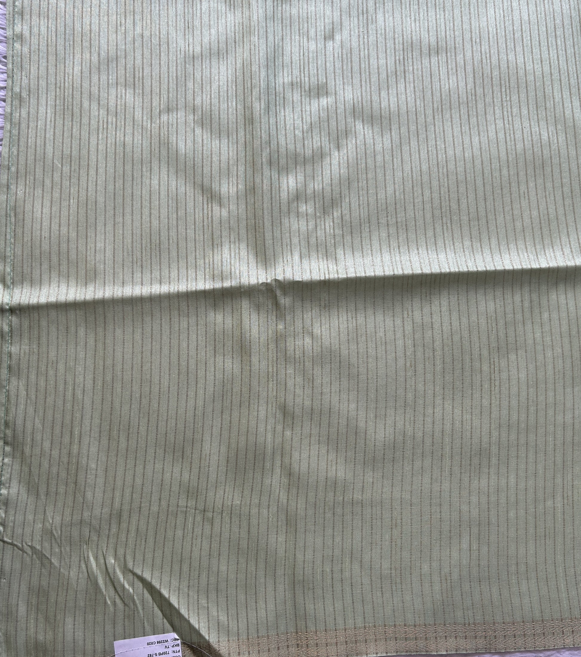 Semi Tussar Saree Colored Light Green Complemented with a Zari Border. - Sampradaya Designer Studio