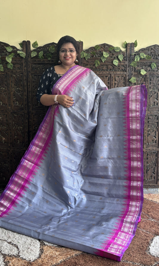 Gadwal Silk Saree Gray Colored Complemented With a Pink Zari Border - Sampradaya Designer Studio