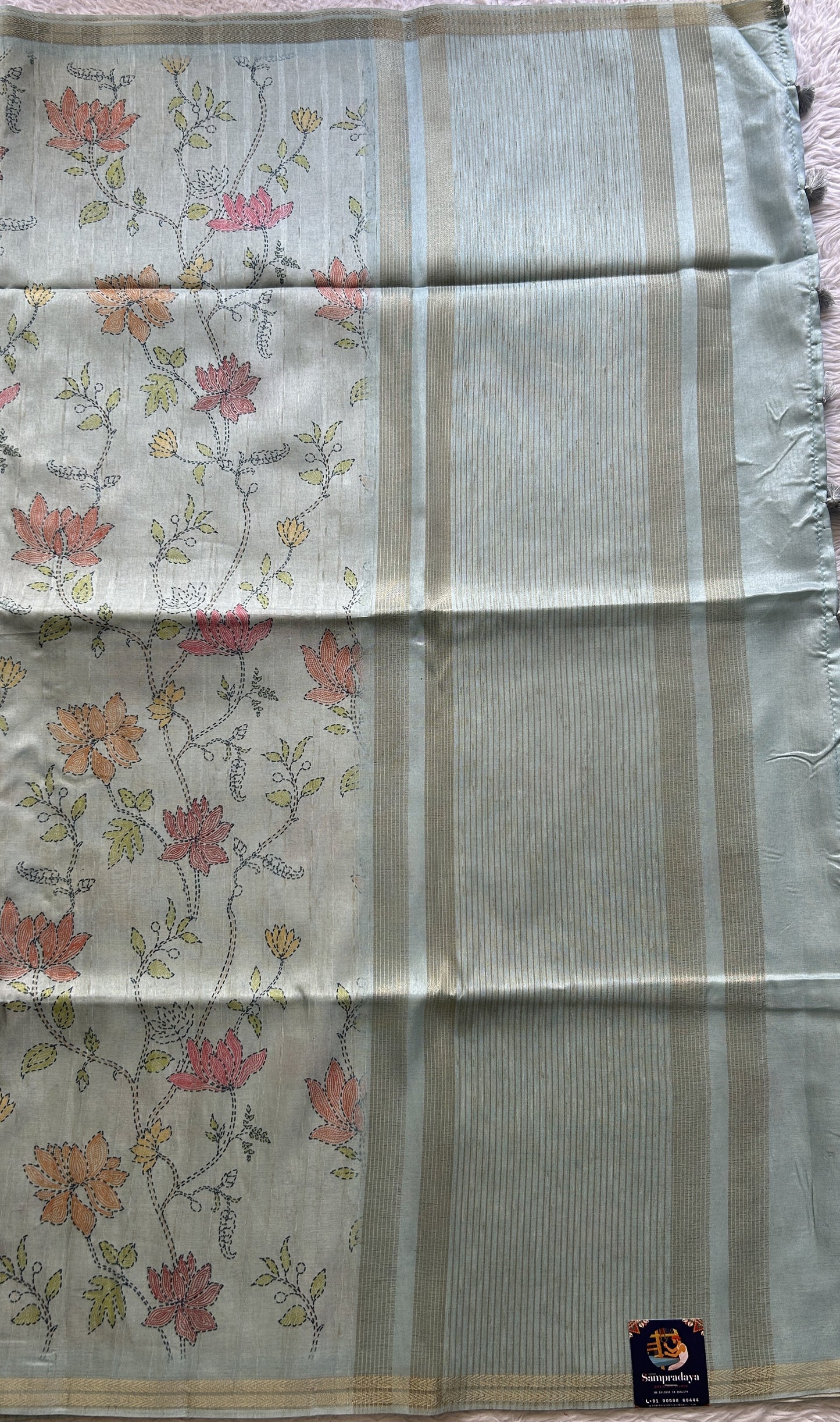 Semi Tussar Saree Colored Grayish Blue Complemented with a Zari Border. - Sampradaya Designer Studio