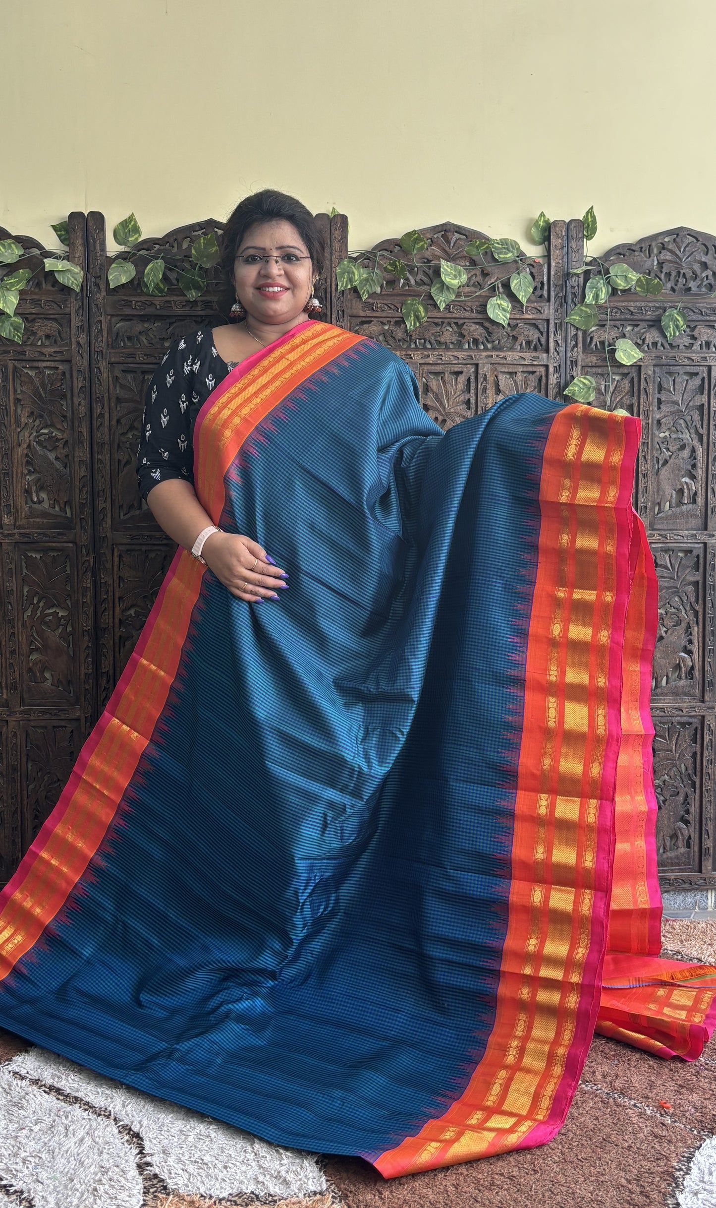 Gadwal Silk Saree Peacock Blue Colored Complemented With a Peach Zari Border - Sampradaya Designer Studio