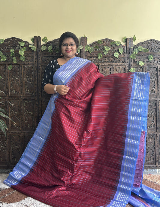 Gadwal Silk Saree Maroon Colored Complemented With a Gray Zari Border - Sampradaya Designer Studio