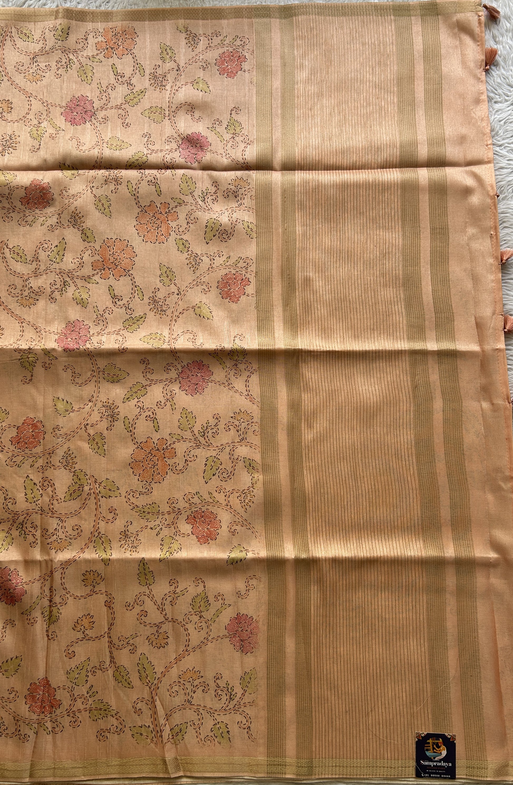 Semi Tussar Saree Colored Pale Orange Complemented with a Zari Border. - Sampradaya Designer Studio