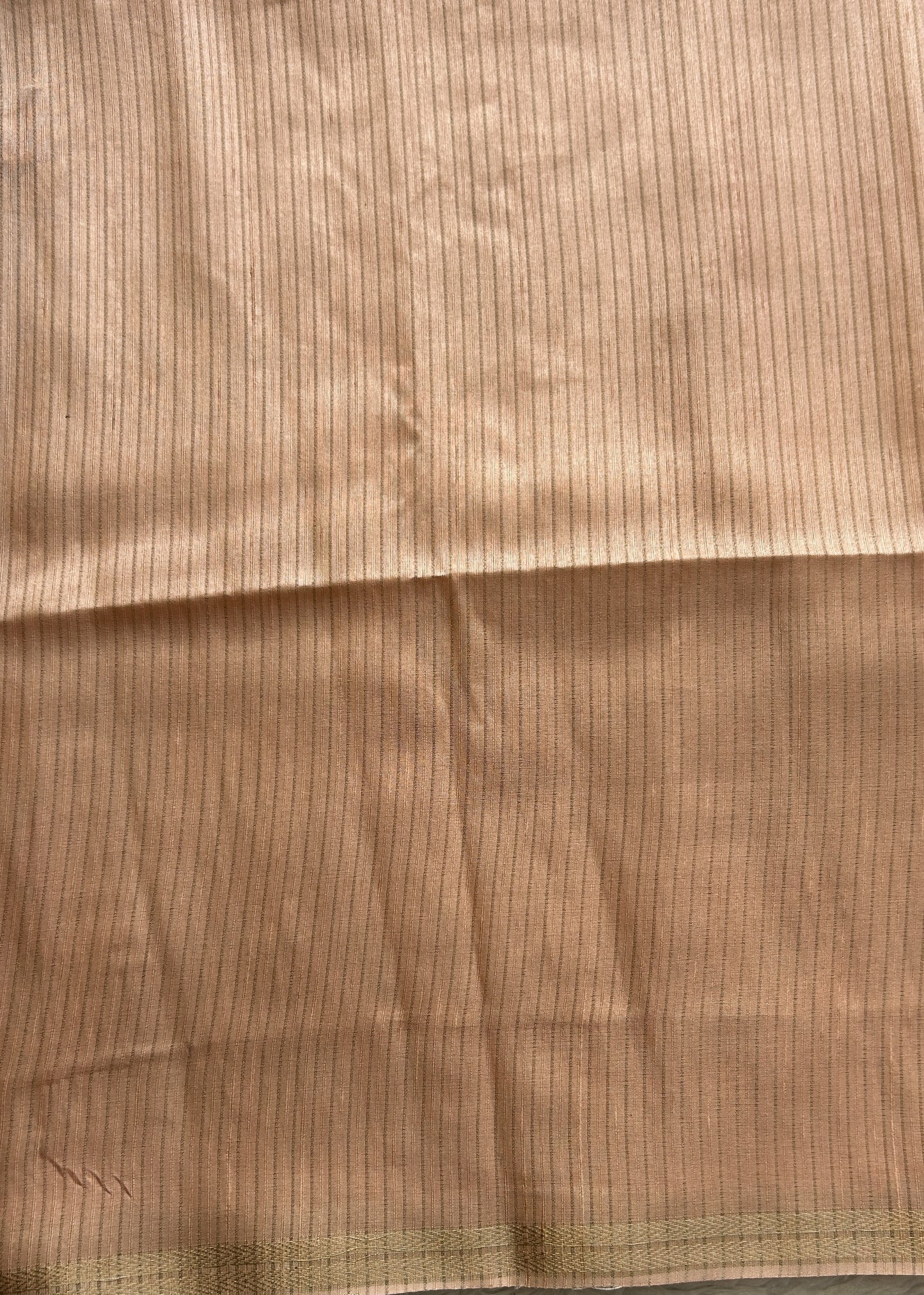 Semi Tussar Saree Colored Pale Orange Complemented with a Zari Border. - Sampradaya Designer Studio