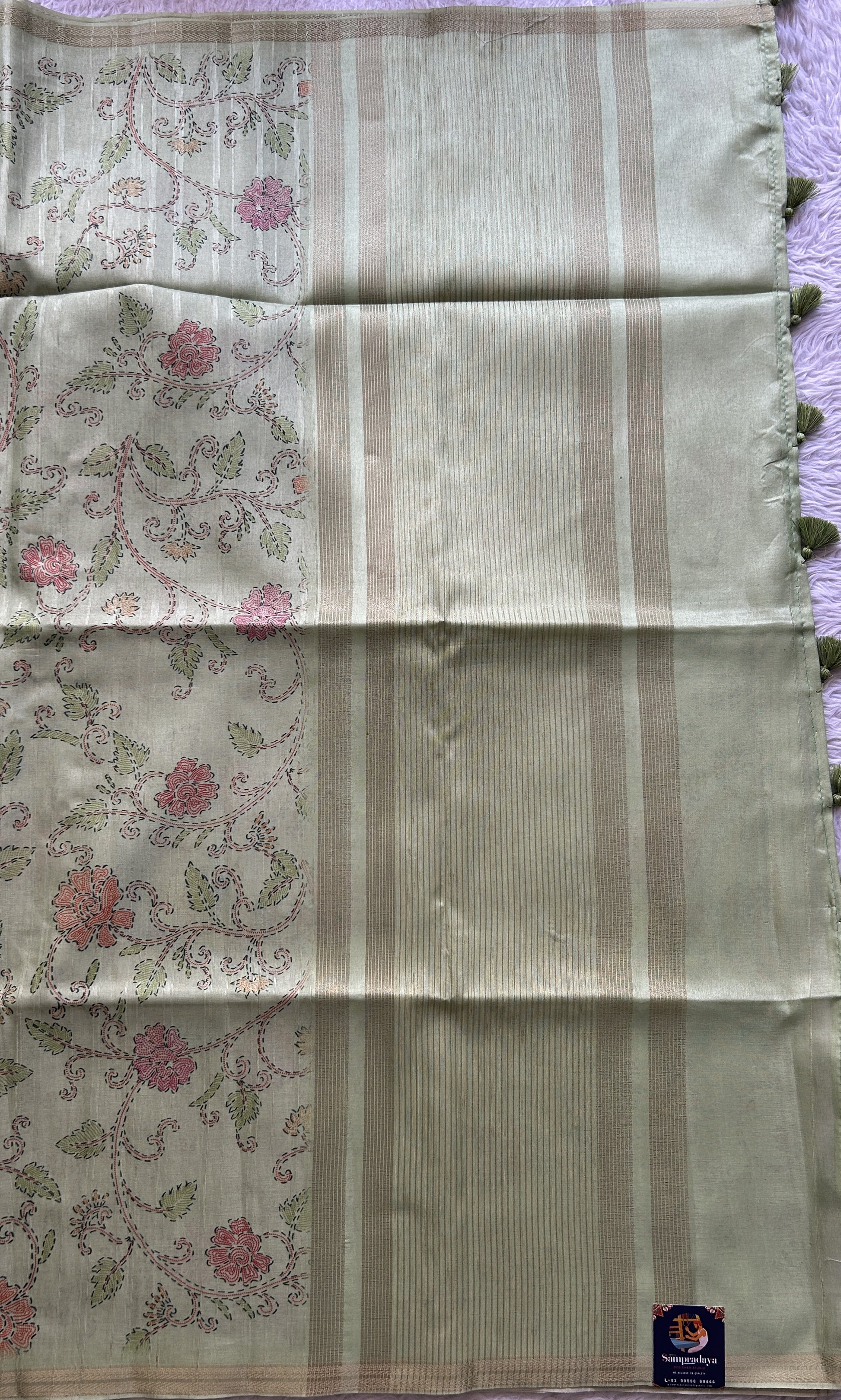 Semi Tussar Saree Colored Parrot Green Complemented with a Zari Border. - Sampradaya Designer Studio