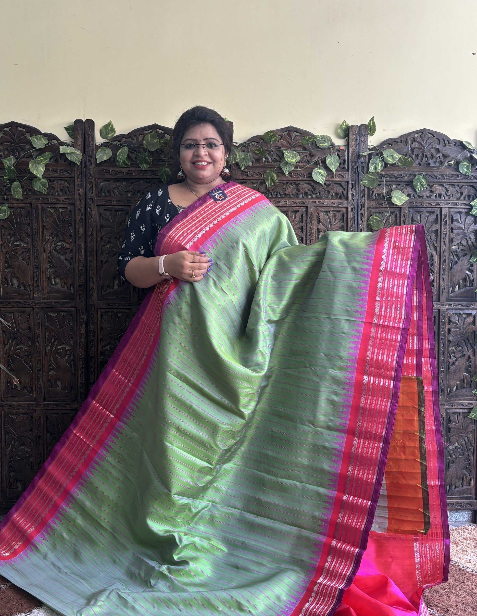 Gadwal Silk Saree Light Green Colored Complemented With a Pink Zari Border - Sampradaya Designer Studio