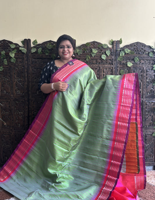 Gadwal Silk Saree Light Green Colored Complemented With a Pink Zari Border - Sampradaya Designer Studio