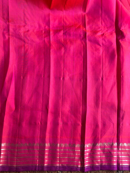 Gadwal Silk Saree Light Green Colored Complemented With a Pink Zari Border - Sampradaya Designer Studio