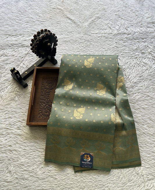 Tissue Organza Saree Sea Green Colored Complemented with a Zari Border. - Sampradaya Designer Studio