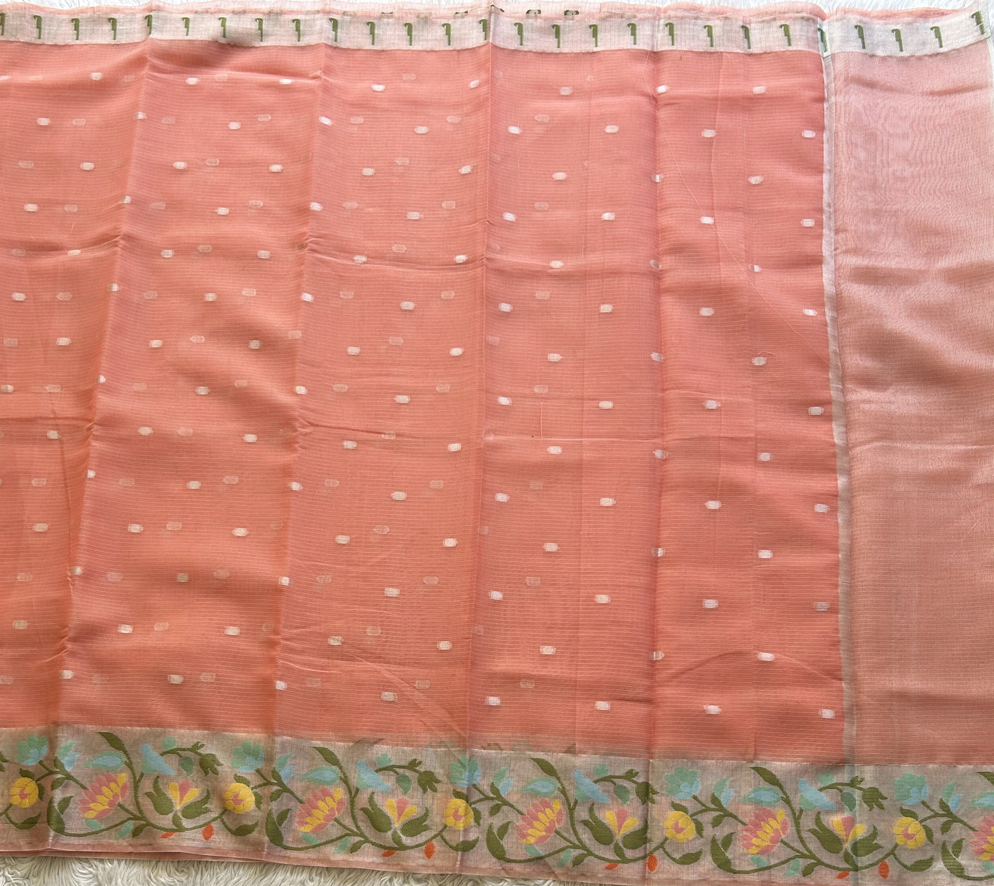 Silk Kota Saree Light Peach Colored Elegantly Paired with a Tissue Border