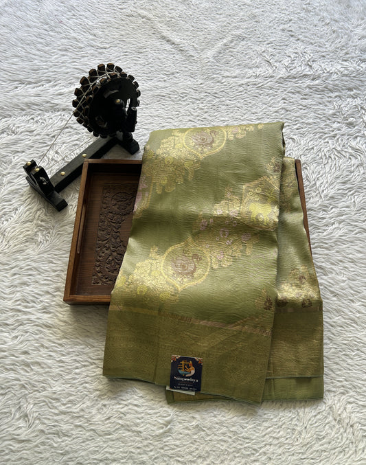Tissue Organza Saree Very Light Green Colored Complemented with a Zari Border. - Sampradaya Designer Studio