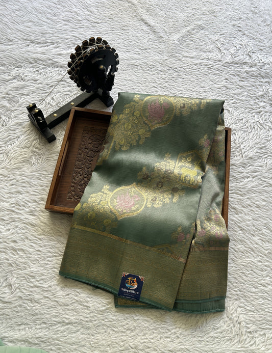 Tissue Organza Saree Aqua Green Colored Complemented with a Zari Border. - Sampradaya Designer Studio