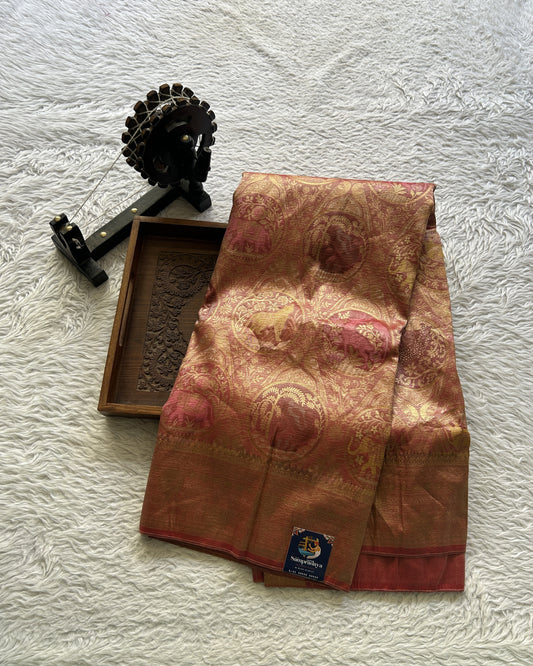 Tissue Organza Saree Dark Peach Colored Complemented with a Zari Border. - Sampradaya Designer Studio