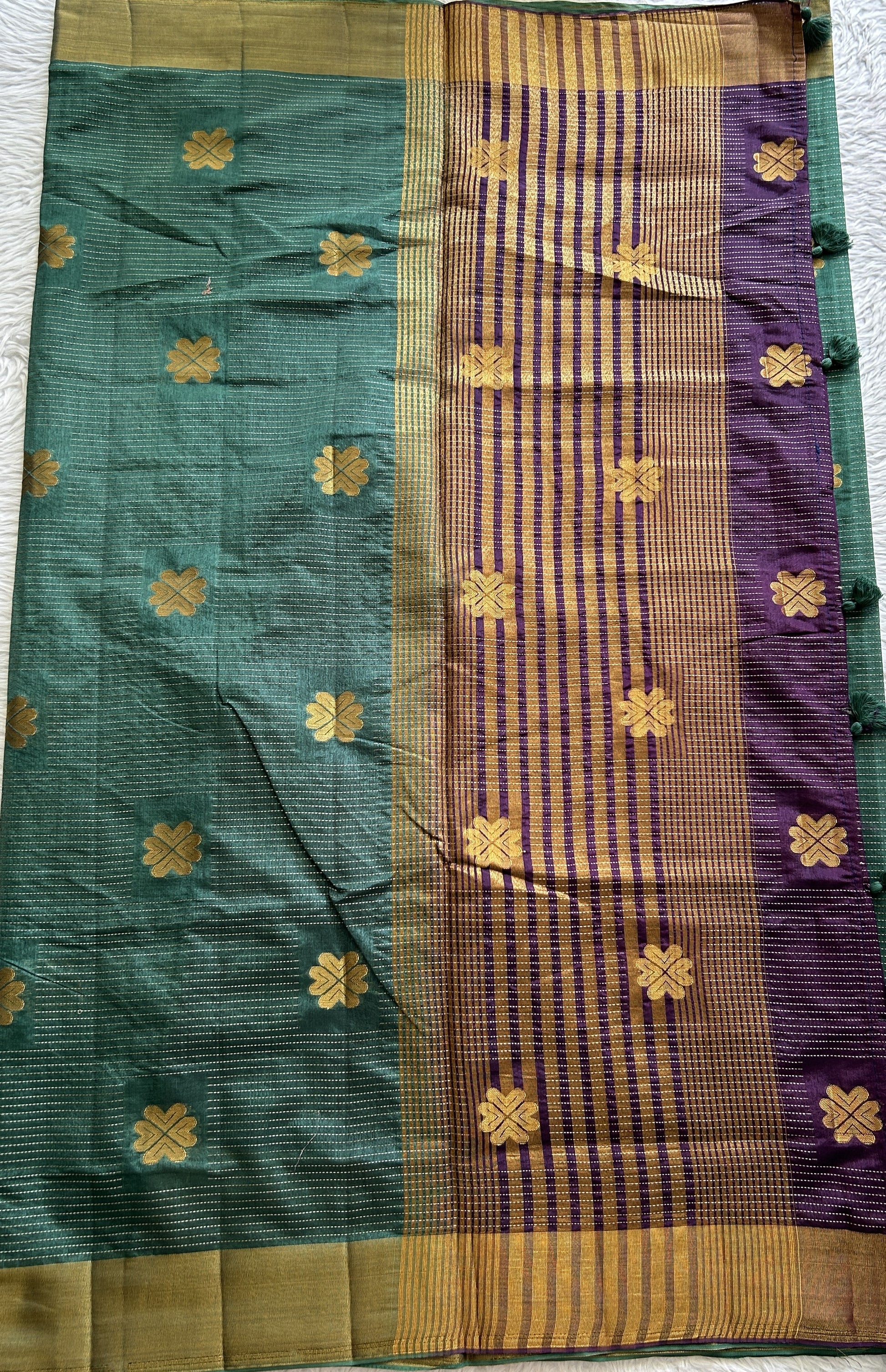 Semi Tussar Saree Bottle Green Colored Complemented with a Zari Border. - Sampradaya Designer Studio
