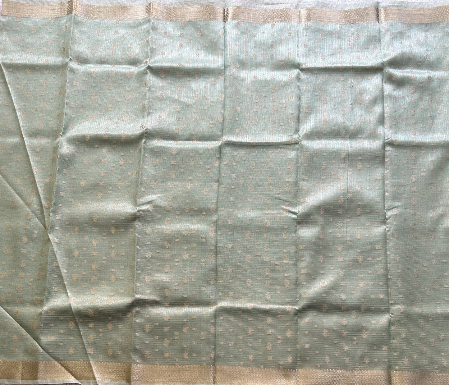 Tissue Kota Saree Mint Green Colored Elegantly Paired with a Tissue Border