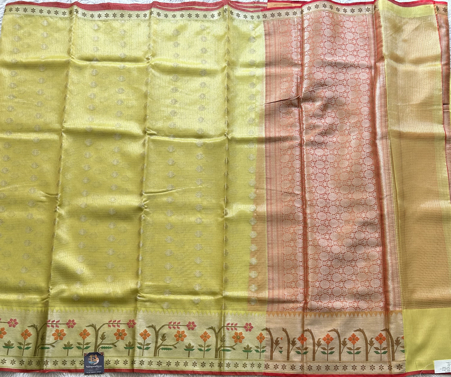 Tissue Kota Saree Yellow Colored Elegantly Paired with a Tissue Border