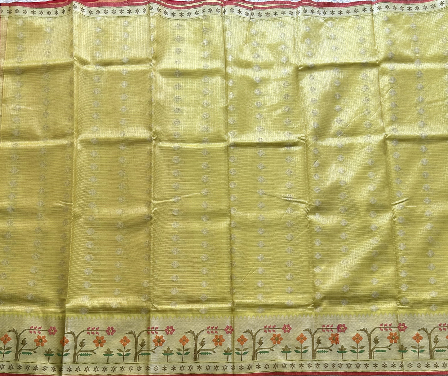 Tissue Kota Saree Yellow Colored Elegantly Paired with a Tissue Border