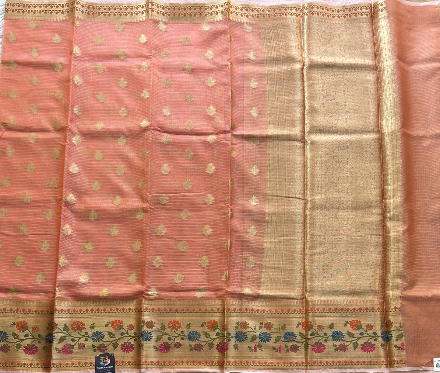 Tissue Kota Saree Dark Peach Colored Elegantly Paired with a Tissue Border