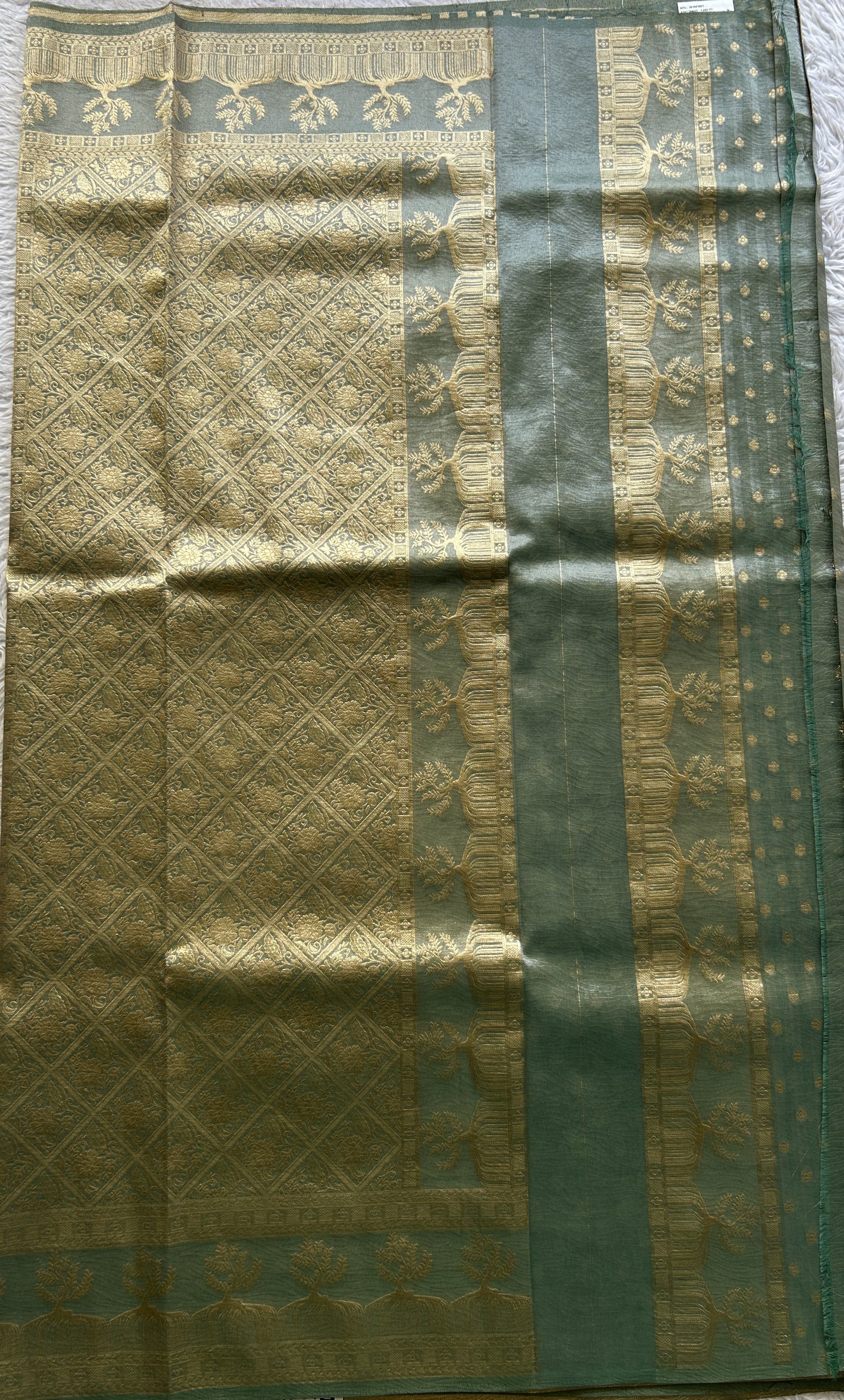 Tissue Organza Saree Sea Green Colored Complemented with a Zari Border. - Sampradaya Designer Studio