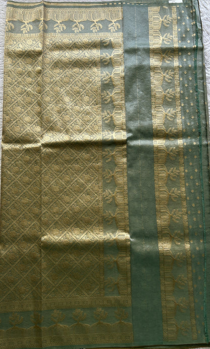 Tissue Organza Saree Sea Green Colored Complemented with a Zari Border. - Sampradaya Designer Studio