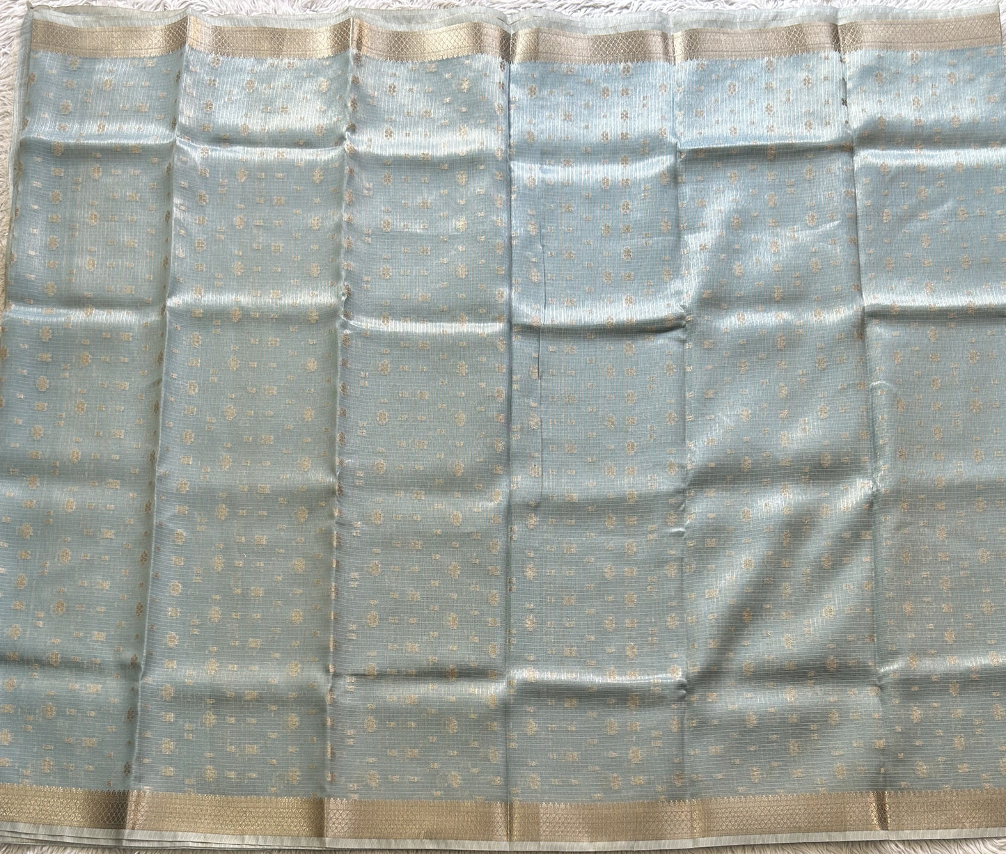 Tissue Kota Saree Ice Blue Colored Elegantly Paired with a Tissue Border