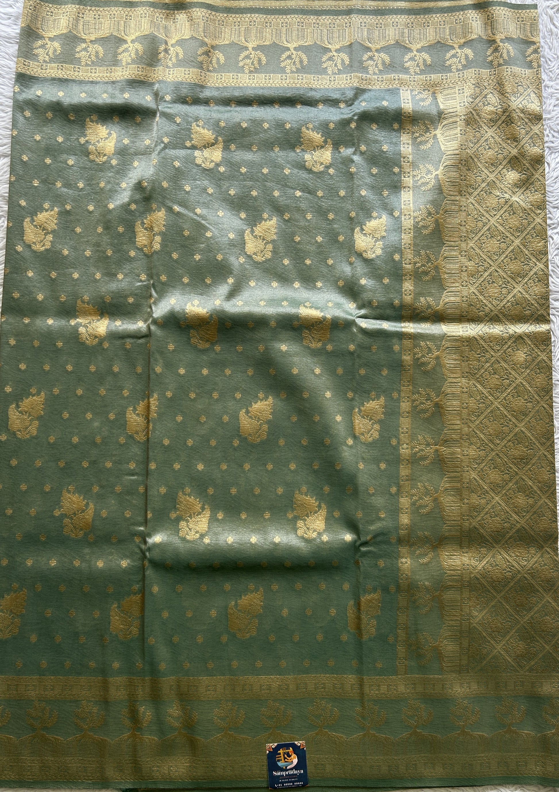 Tissue Organza Saree Sea Green Colored Complemented with a Zari Border. - Sampradaya Designer Studio