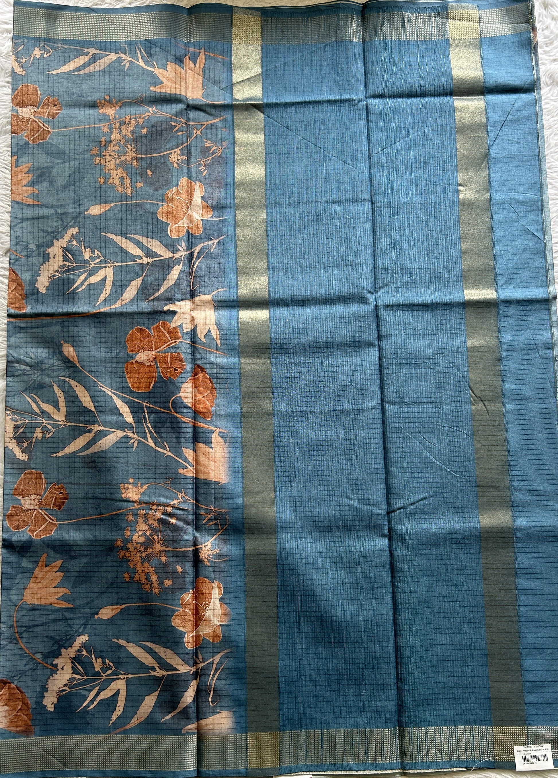 Semi Tussar Saree Light Blue Colored complemented with a Zari Border. - Sampradaya Designer Studio