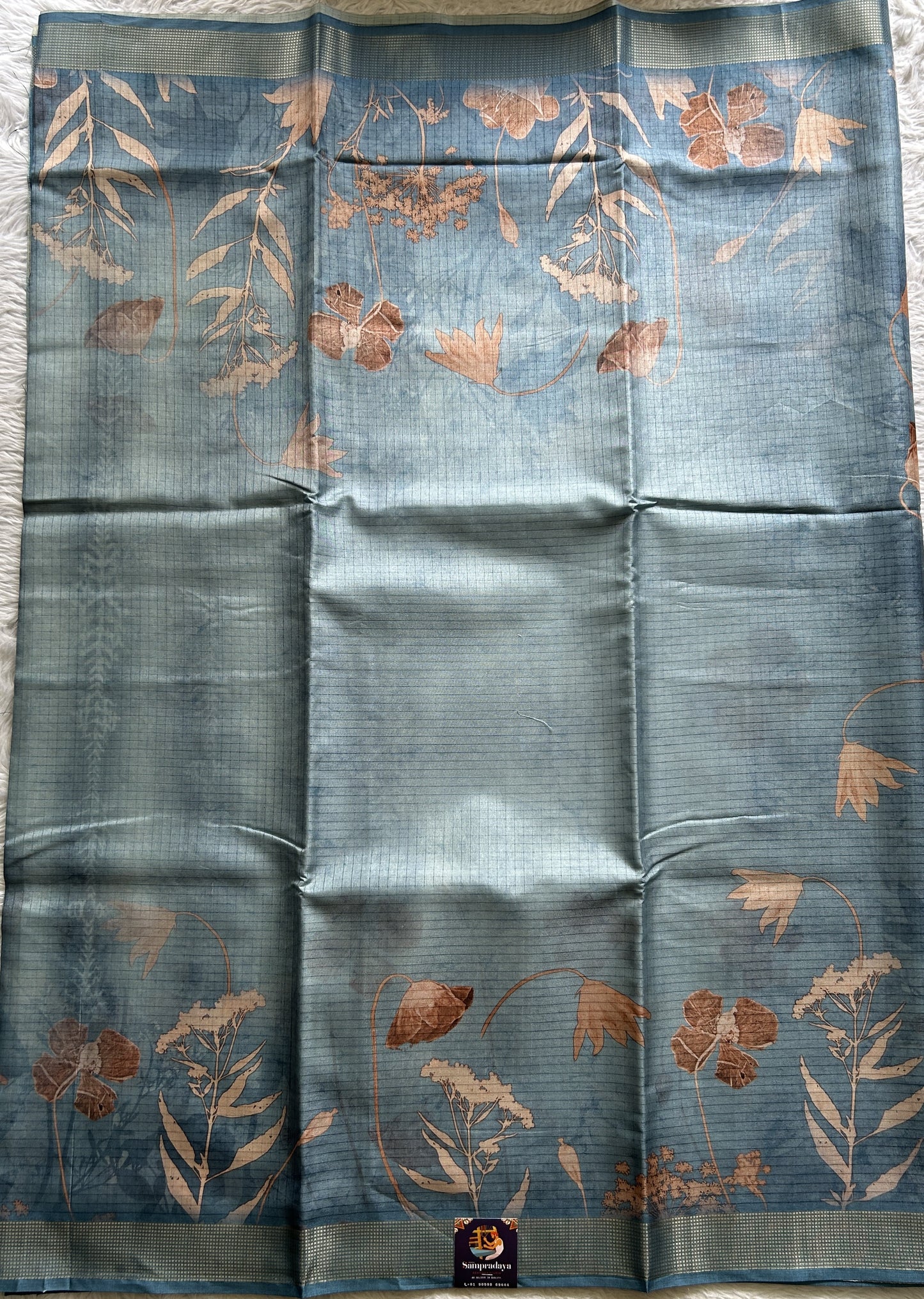 Semi Tussar Saree Light Blue Colored complemented with a Zari Border. - Sampradaya Designer Studio